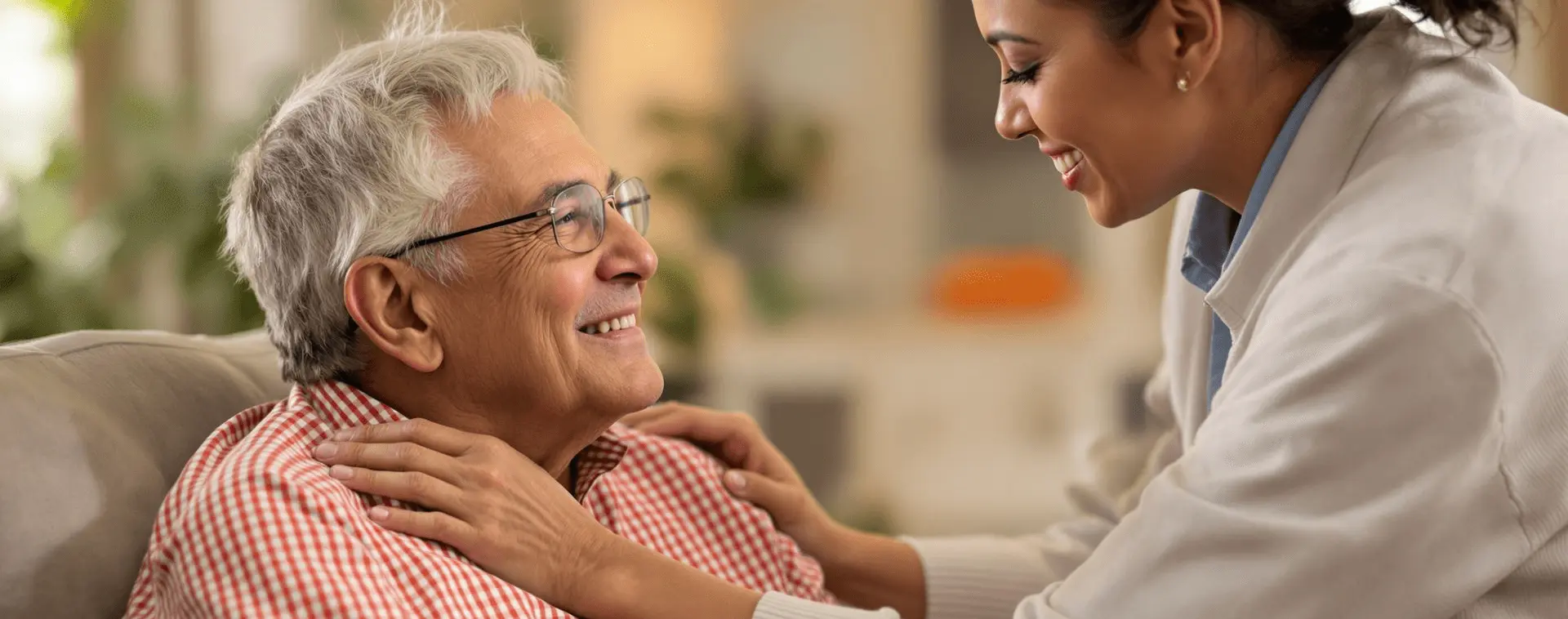 A family caregiver helping a veteran at home, representing support, training, and stipend benefits through the Veterans Family Caregiver Program