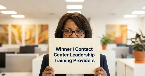 Contact Center Executive holding an envelop that reads Winner Contact Center Leadership Training Providers inside a modern contact center workspace