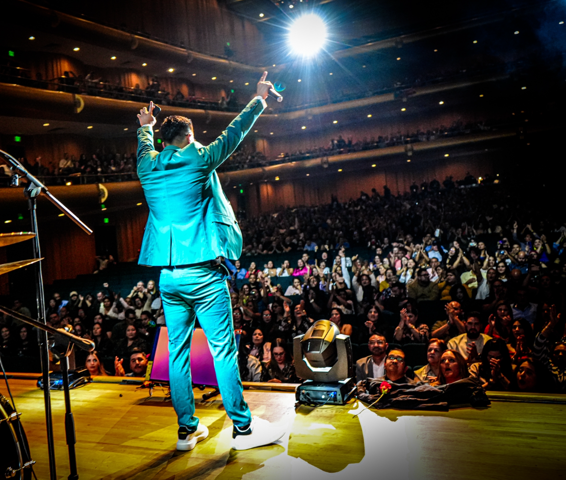 Senxao Latin band performing live for a large audience