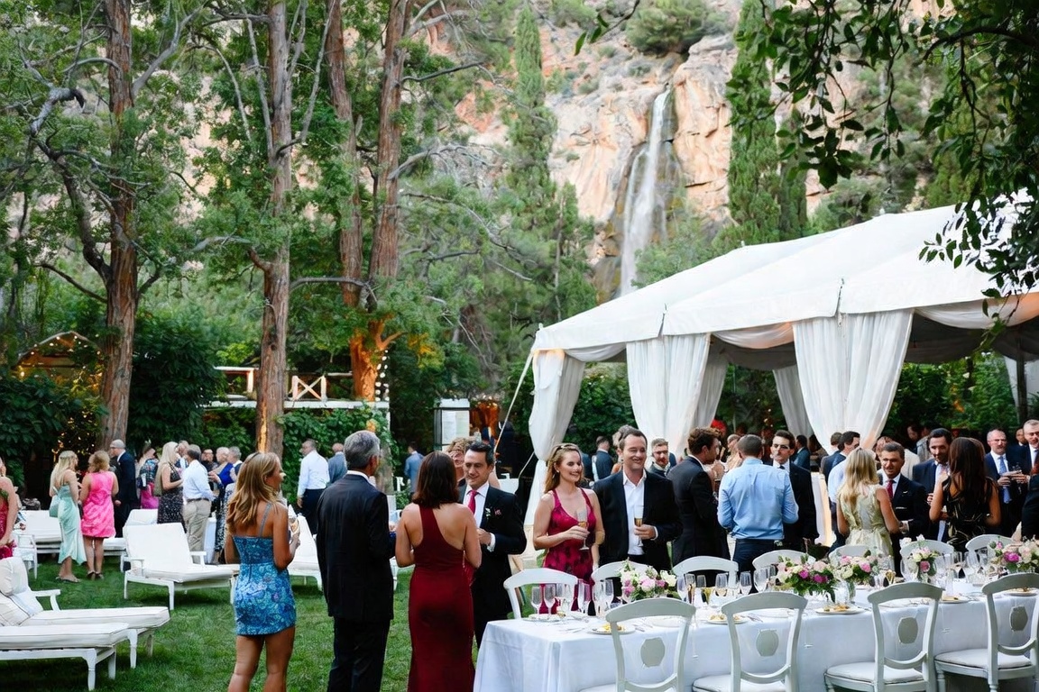 Outdoor destination wedding reception in a scenic mountain venue