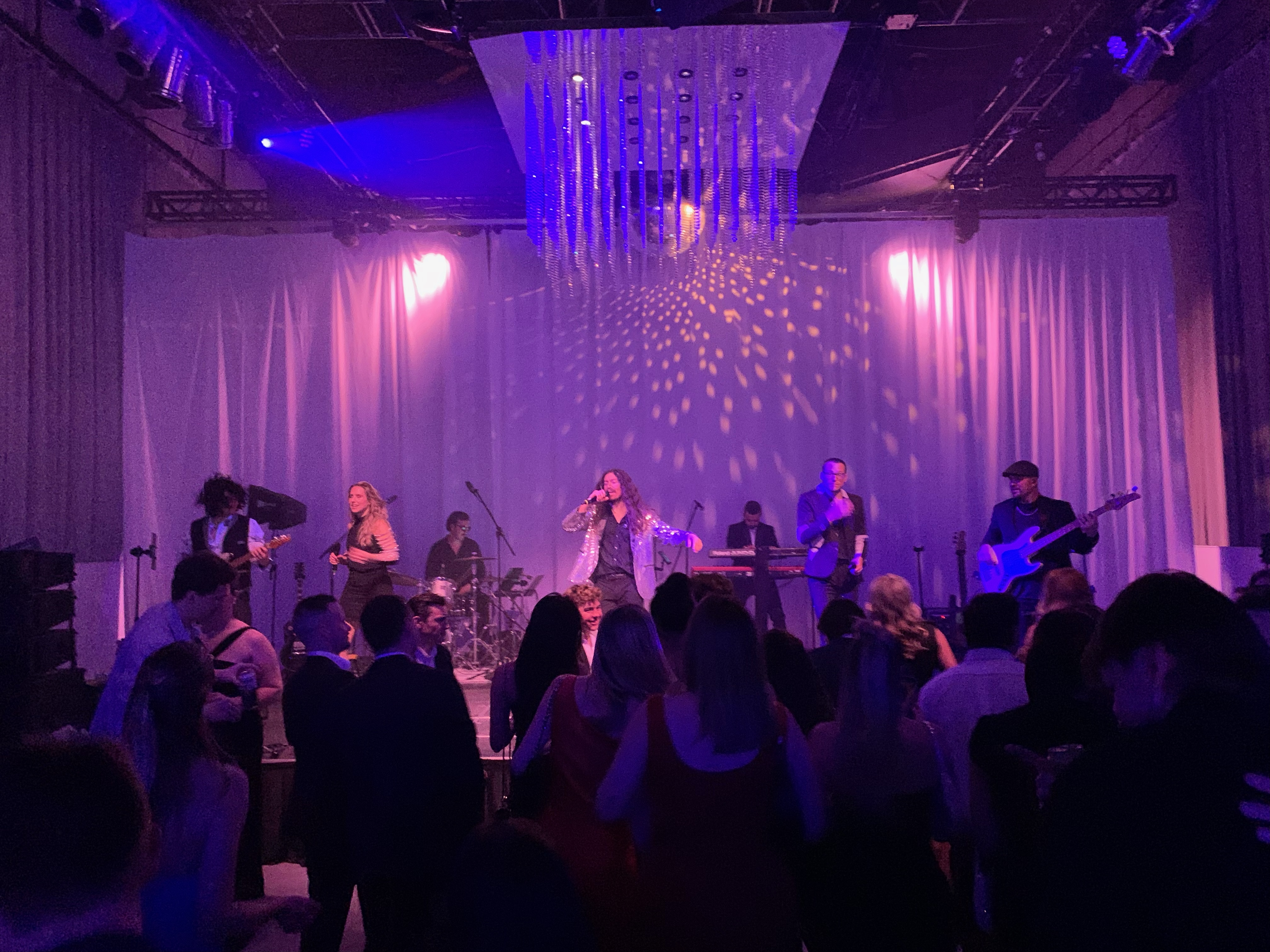 Party Echelon® performing live for guests on a corporate event dance floor