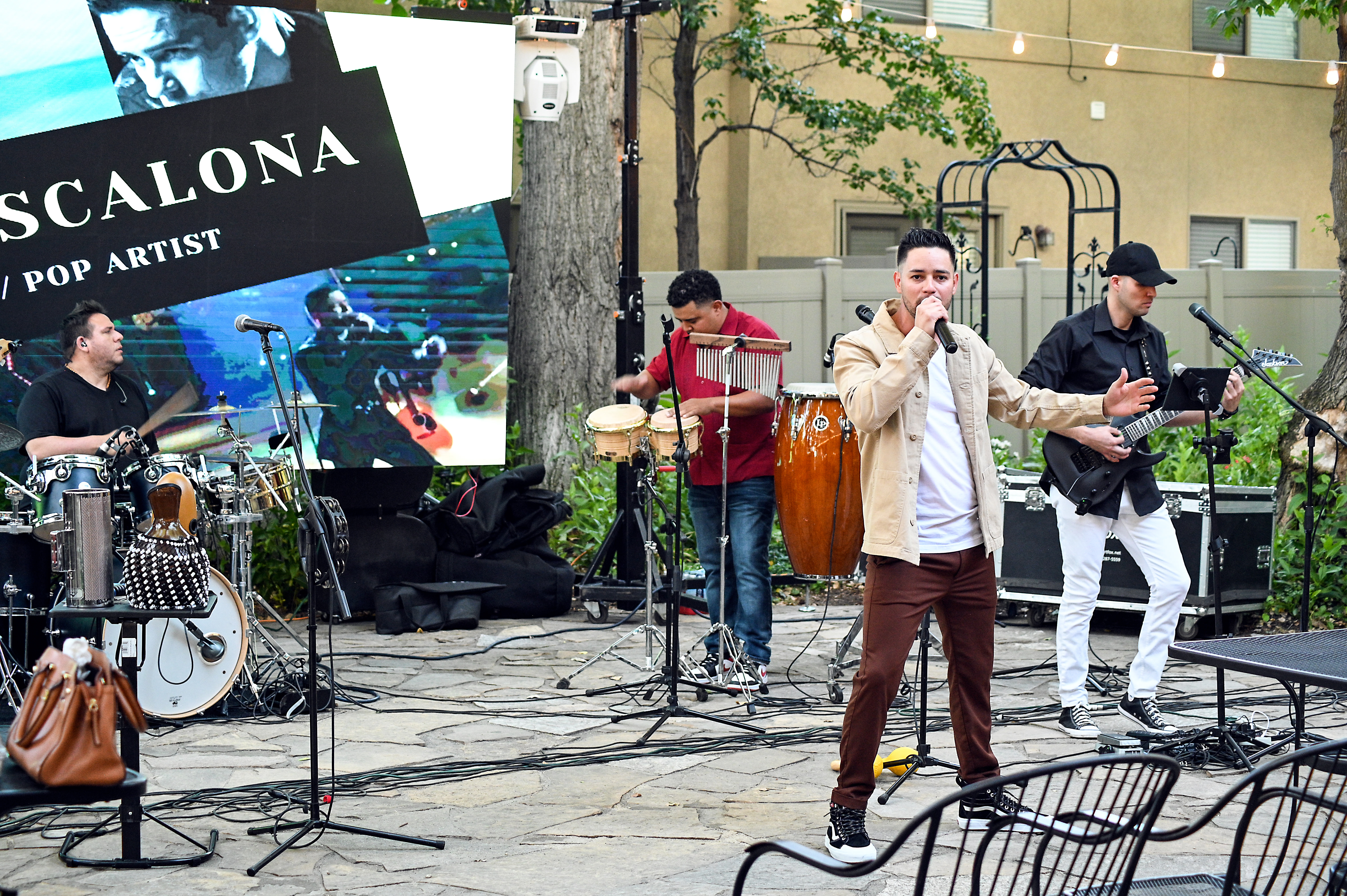 Senxao Latin Party Band performing live for a large audience
