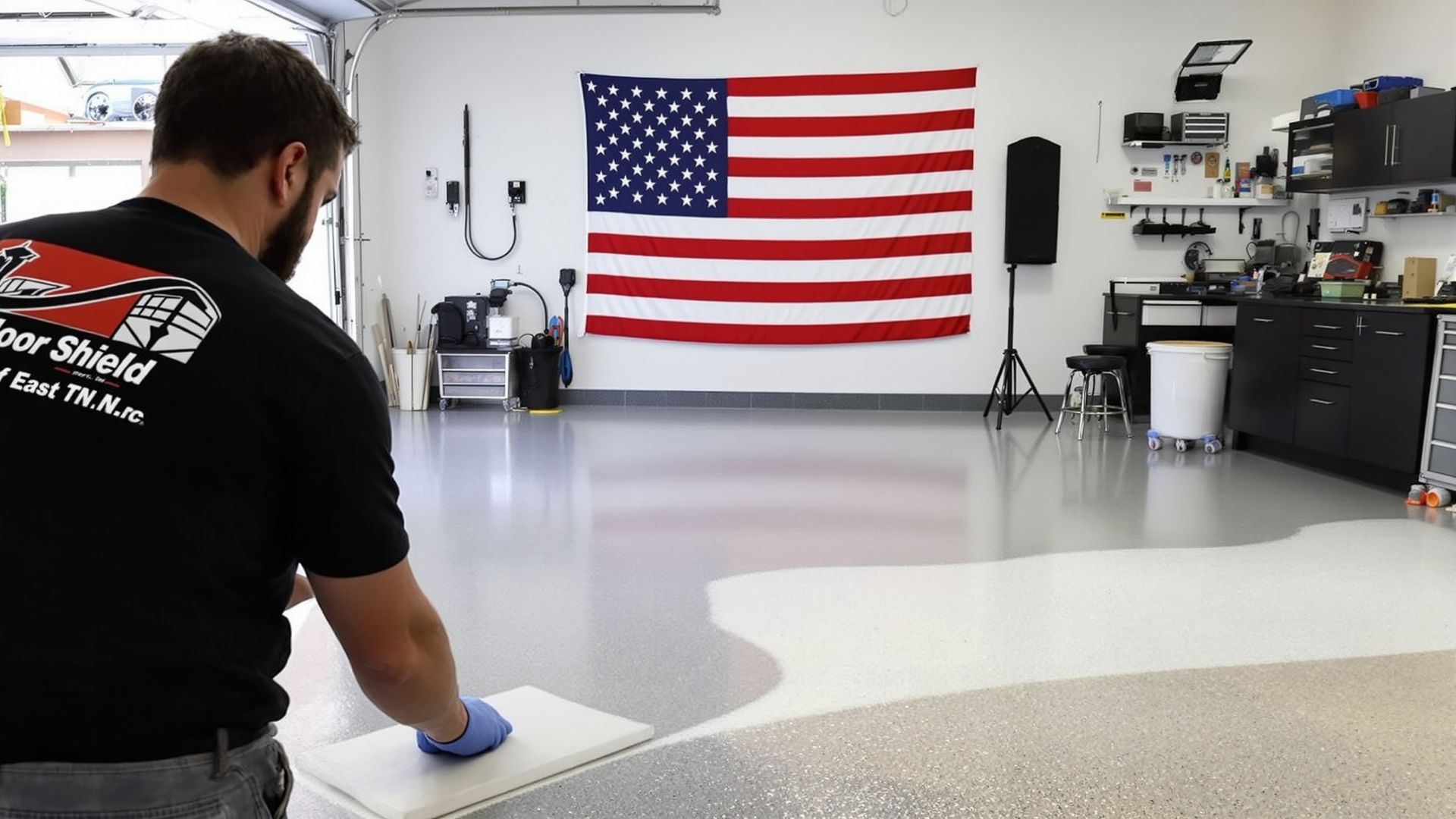 “Veteran-owned Floor Shield of East TN technician preparing the concrete before coating.” “Veteran-owned Floor Shield of East TN technician preparing the concrete before coating.”
